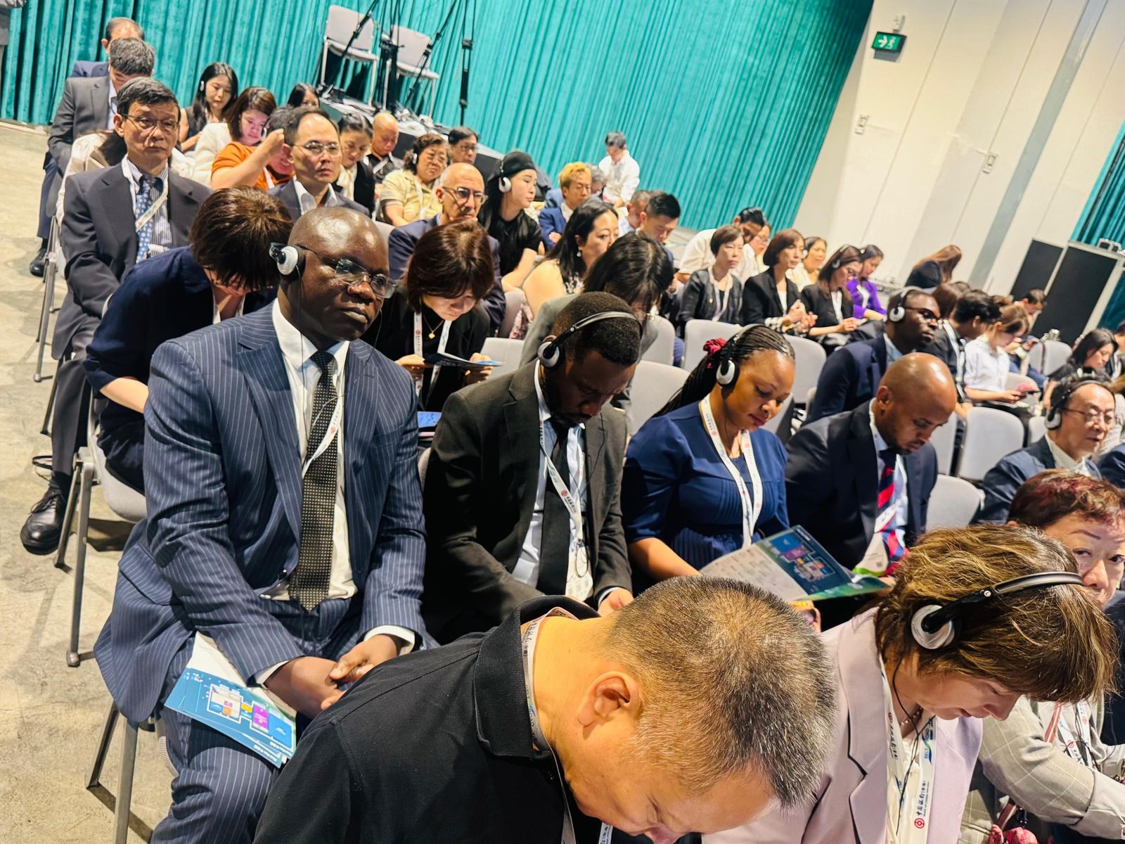 Tanzanian delegates in the New Market Focus session, Hall 5E